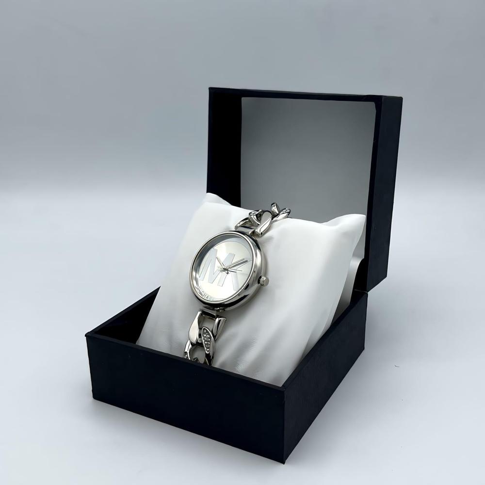 Michael Kors Women’s Stainless Steel Watch – Silver Dial with MK Logo